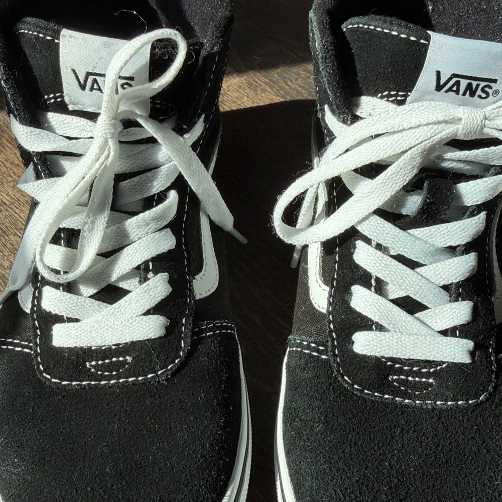 Vans Off The Wall Black and White High-Top Skate Sneakers